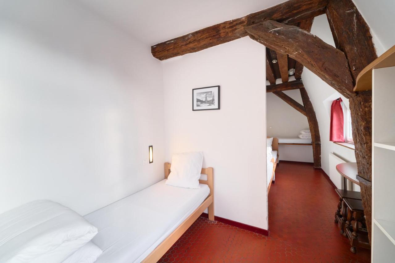 Mije Marais Hostel Paris Exterior foto A typical room at the hotel